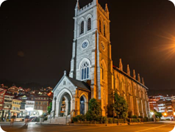 Lit church facade at night in Shimla heritage